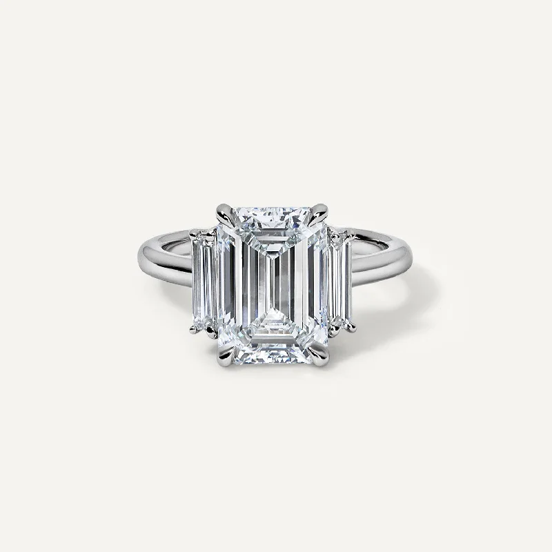 luxurious diamond engagement rings-Three Stone Emerald Cut with Straight Baguettes