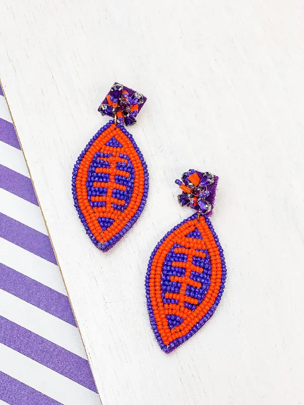 casual earrings for women-Glitzy Post Football Dangle Earrings - Purple & Orange